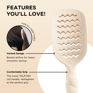 Beige paddle hair brush with features highlighted on a beige background