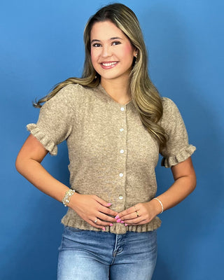 Taupe Short Sleeve Knit Ruffle Button Cardigan featuring pearl-style buttons, ruffle trim, soft stretch knit