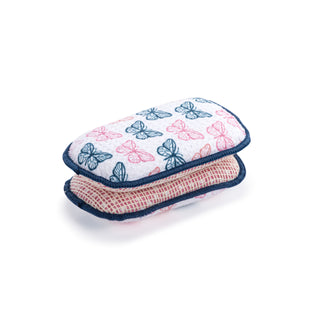 Ultra absorbent kitchen sponge with butterfly pattern on a white background